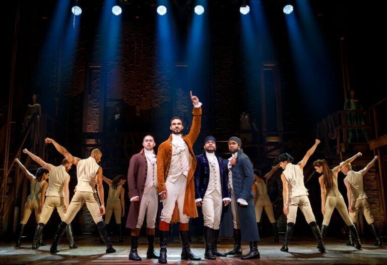 Hamilton Cast on stage being filmed for Disney +'s digital release.