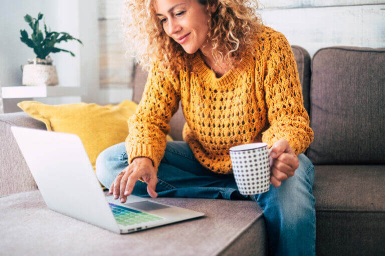 An actress looking up our list of 31 at-home activities for every day this month.